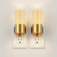 Pack of 2 LED night lights plugged into a wall outlet